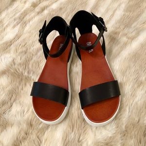 Black platform sandals with ankle strap